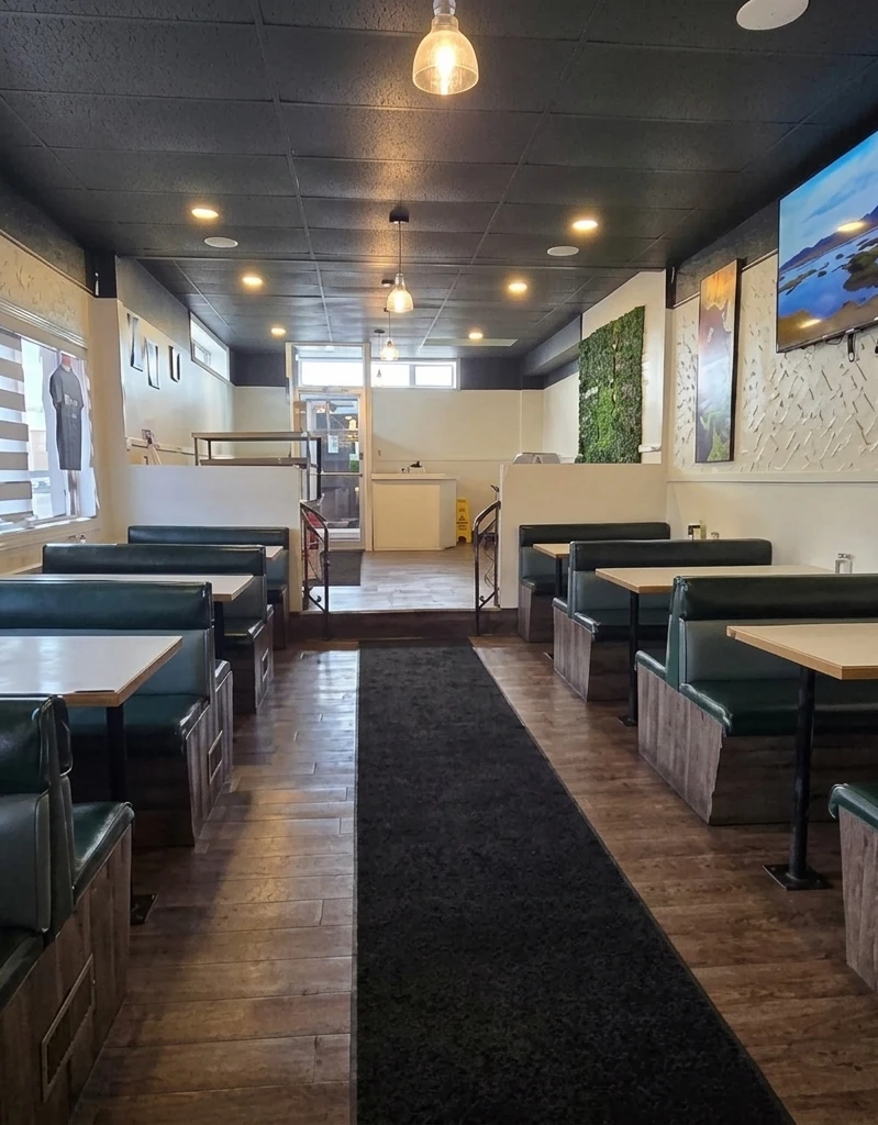 Oven Delight - Pizza & East Indian Restaurant dining room on Kent Road, Winnipeg